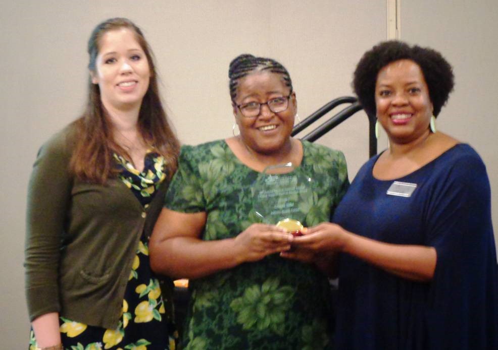 Image of Glenda Elder accepting award for Clinical Support Staff of the Year